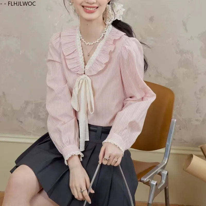 Pink Ruffles Blouse with Bow Tie & Button Detail by Cralom